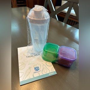 Beachbody portion containers, shakeology shaker cup, and tracker book